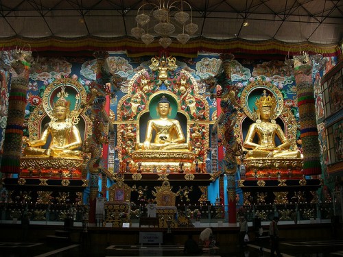 The Lord Buddha, flanked by Lord Padmasambhava and Lord Amitayus on either side.
