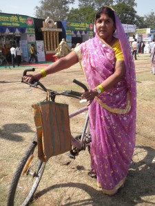 Rajkumari Devi, the 58-year-old mother of three grown up children, cycles through the dusty lanes of the villages in Bihar's Muzzaffarpur district, giving tips to people on kitchen farming and on developing the right agro-based products for business.