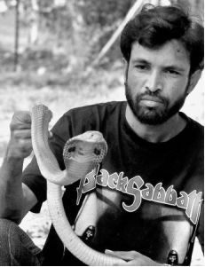 Late Raj Kumar Kanuri with a Cobra snake