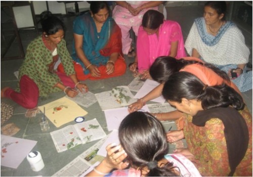 File covers and folders made from natural materials and embellished with dried flowers and leaves are quite a rage in the corporate world these days and it has worked out well for scores of rural women in Uttarakhand, who are able to earn a decent living making these products. (Credit: Nitin Jugran Bahuguna\WFS)