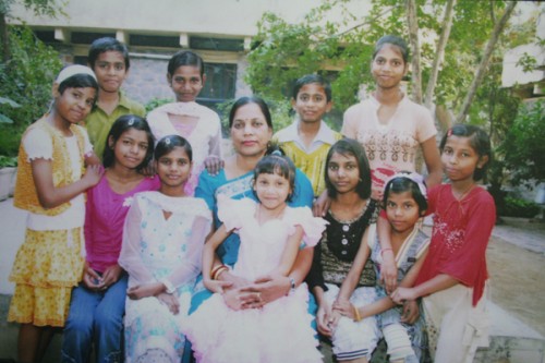 Savita Mohanty with her 'children' at the SOS Children's Village Greenfields. (Credit: Shamsher Bahadur\WFS)