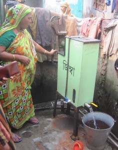 Women in a slum using ZIMBA to get clean water