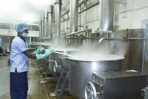 Rice being cooked in Akshaya Patra kitchen