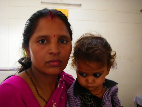 Nirmala with her adopted daughter, Ankita. Nirmala is one of several courageous women in Uttar Pradesh, who fought with her own relatives to save the life of a baby girl.