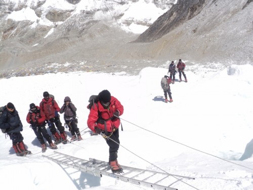 Flight Lieutenant Nivedita Choudhary climbing the ladder at Khmbu icefall during the ascent to Mt Everest. (Credit: Nivedita Choudhary\WFS)