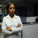 Rohra at her Mumbai work place_ with the portable scan-n-read device.