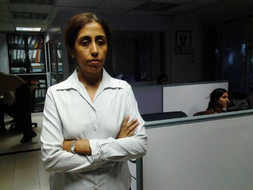 Rohra at her Mumbai work place_ with the portable scan-n-read device. 