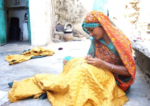 Visit Dilwara around mid-day and chances are that you will find many women sitting in the courtyards of their homes, plying their needle. (Credit: WFS)