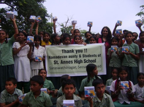 Happy students of a school at Anamalaveedu in Anantapur district after receiving their LED lights.