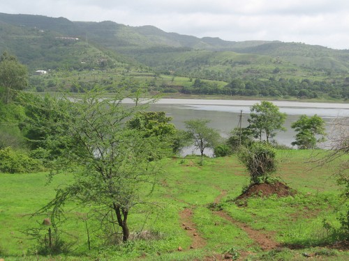 The velvety green mountains serve as a catchment area for the dam.