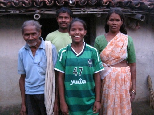 Shivani Toppo with her mothr Jhari Devi and grandfather Dukhan Pahan at their home in Hutup in Ormanjhi Ranchi' 