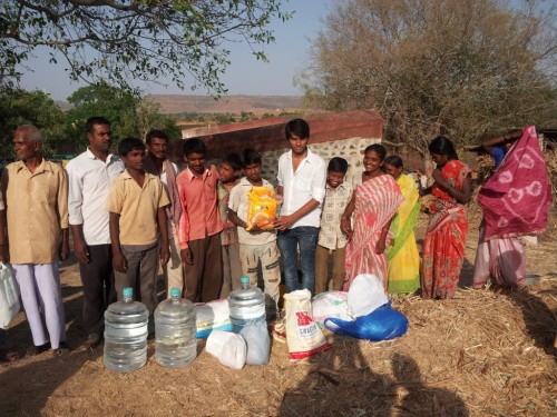 Food and water being distributed to the villagers in the drought-affected areas