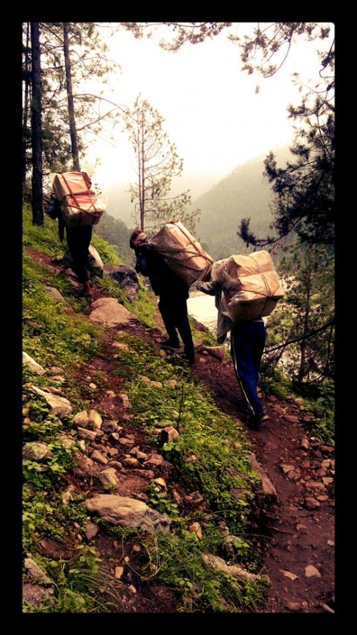 Dedicated and strong team of porters carrying supplies to Bhatwari. the mission would be impossible without them