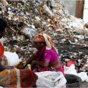As they sift through garbage, waste pickers, who are mostly women, have to fend off stray animals, their hands get wounded by shards of broken glass thrown carelessly in the rubbish, and harassment by the police is part of their daily routine. (Credit: Amit Thavaraj)