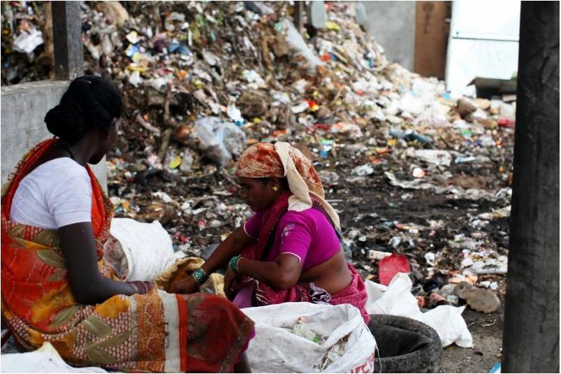 As they sift through garbage, waste pickers, who are mostly women, have to fend off stray animals, their hands get wounded by shards of broken glass thrown carelessly in the rubbish, and harassment by the police is part of their daily routine. (Credit: Amit Thavaraj)