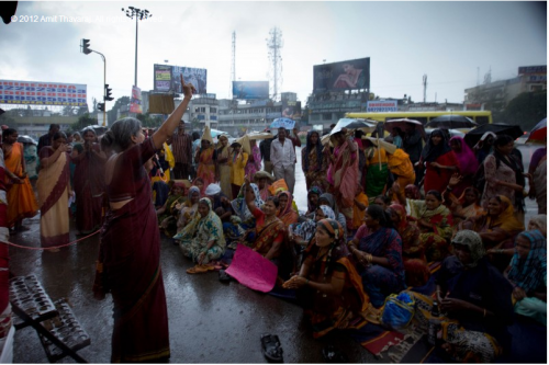 Members of the Kagad Kach Patra Kashtakari Panchayat (KKPKP), a powerful trade union of scrap collectors holds a rally in Pune. The union not only represents the collective identity and interests of scrap collectors, it is also a platform for them to voice their grievances. (Credit: Amit Thavaraj)