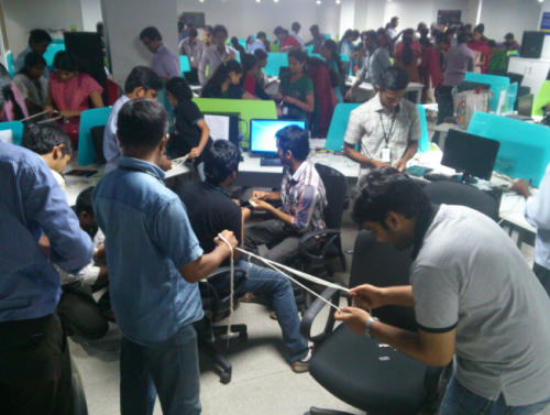 130 employees of RapidValue, an IT firm located at Infopark in Kochi volunteered and made 10,000 wicks