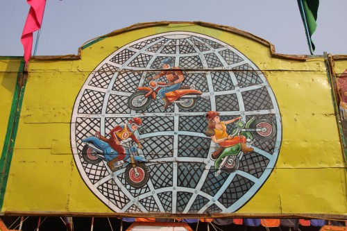  Vertical motorcycle riding, inside a globe.