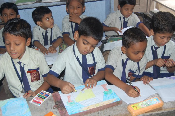 Children participating in an inter-school drawing competition at the school