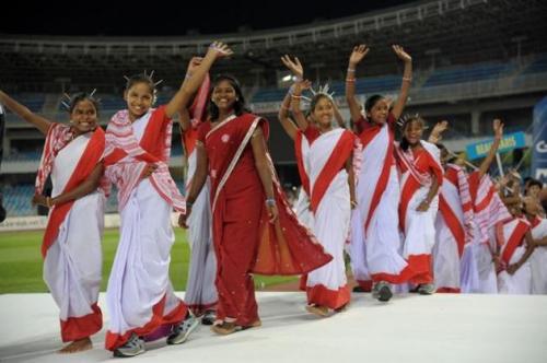 On July 13, 18 tribal girls from Ormanjhi village in Jharkhand cheered in traditional attire after being placed third in the Gasteiz Cup in Spain (Photo Courtesy: The Hindu)