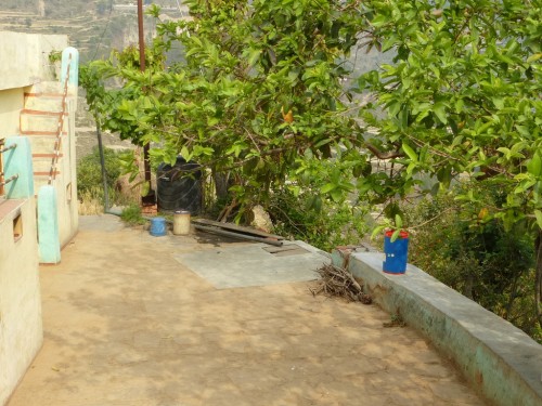 A simple rooftop rainwater harvesting system in Duarab. Here the tank forms part of the yard