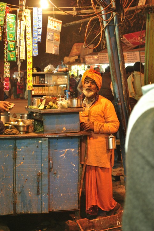 Waiting for freebies at a roadside stall.