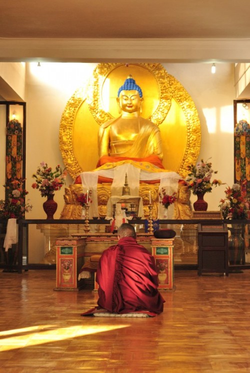 Praying at Shanti Stupa.