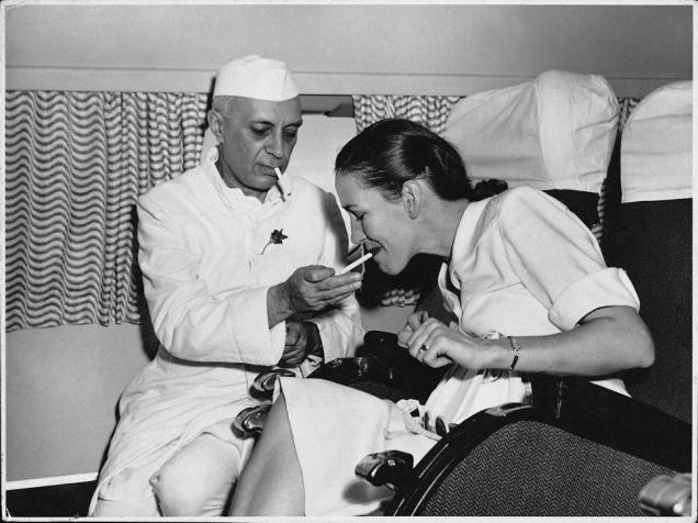 Prime Minister Nehru with Mrs. Simon, the wife ofthe British Deputy High Commissioner, on board the first BOAC flight in India.