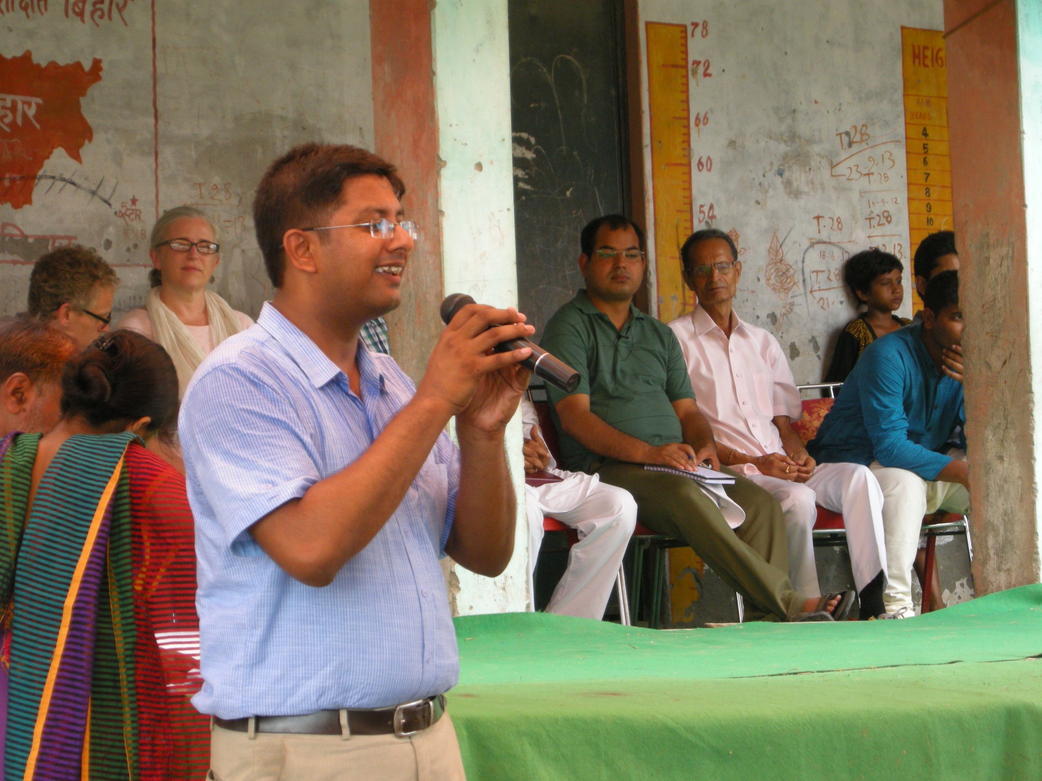 Surya briefing children and community on Prayog and Global literacy project - June 18th, 2014