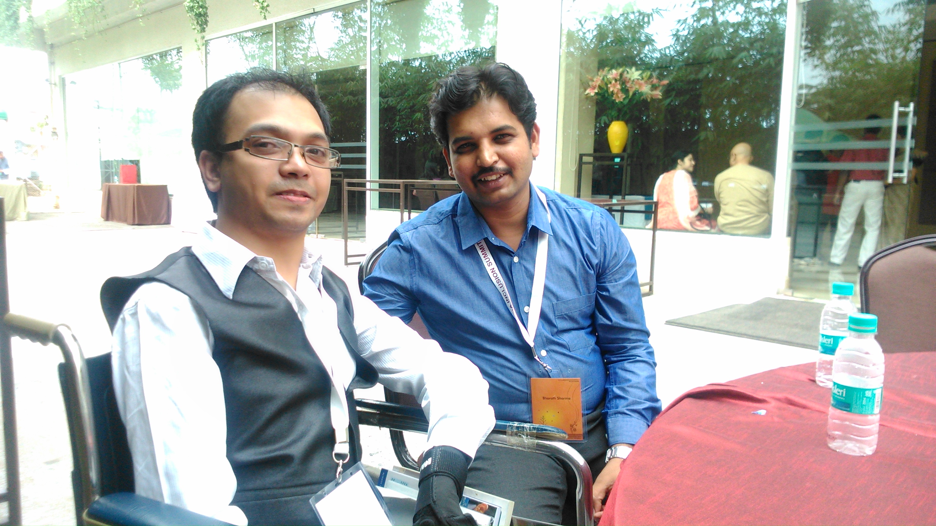 Ashwin (left) with Bharath at India Inclusion Summit, Bangalore.