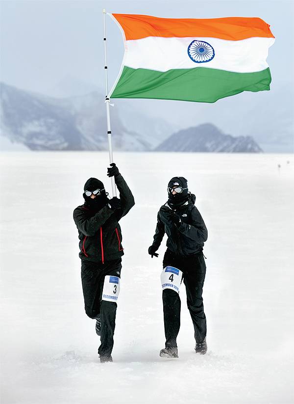 Uma and Krishna with the Indian flag in Antartica