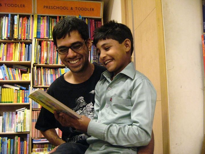 Why did Anoop move from the Plush Room of an Ohio College to the Dusty School Room of a Mumbai Slum?