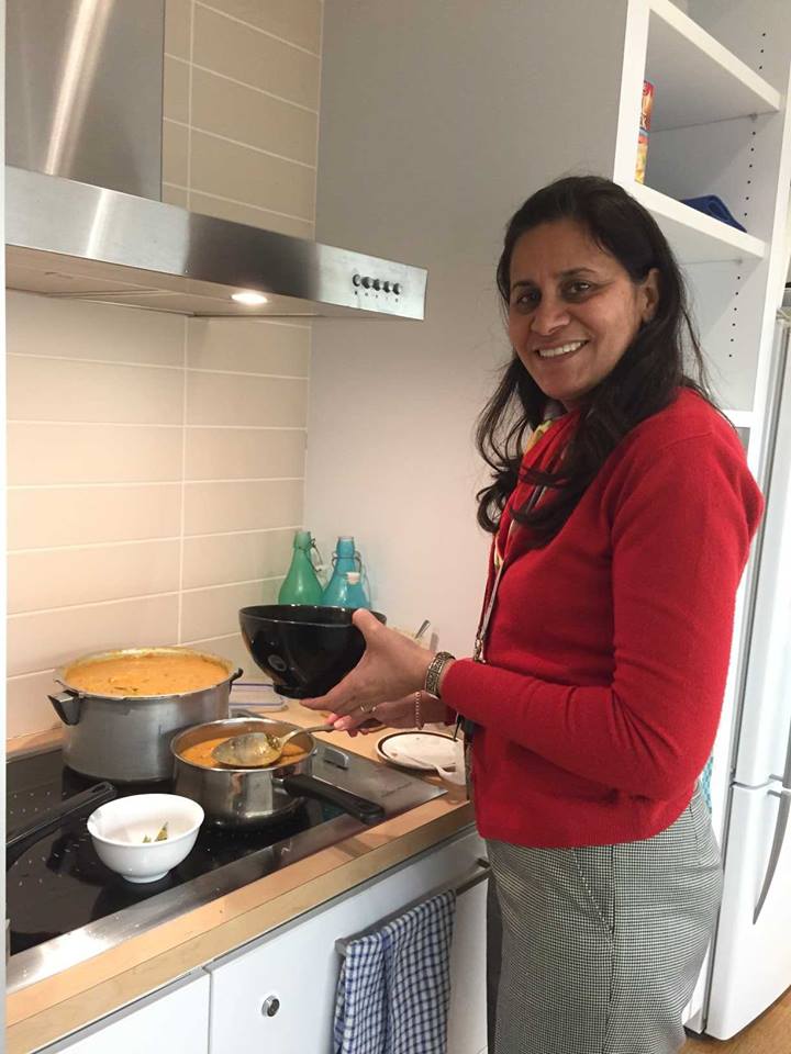 Nandita Bajaj cooking rice and curry at her work place