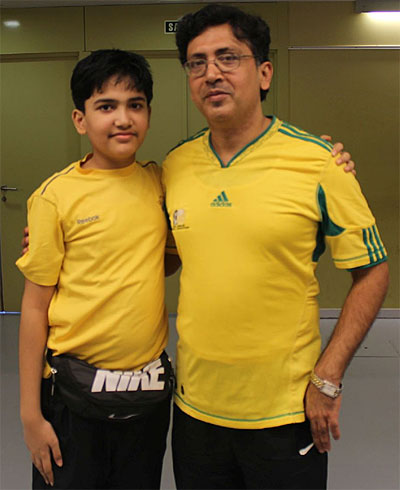 Aryan (left) with his father.