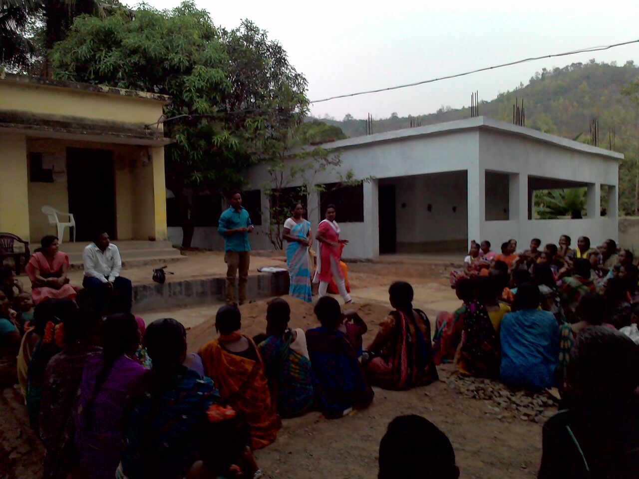 An evening meeting with villagers as most people work during the day 