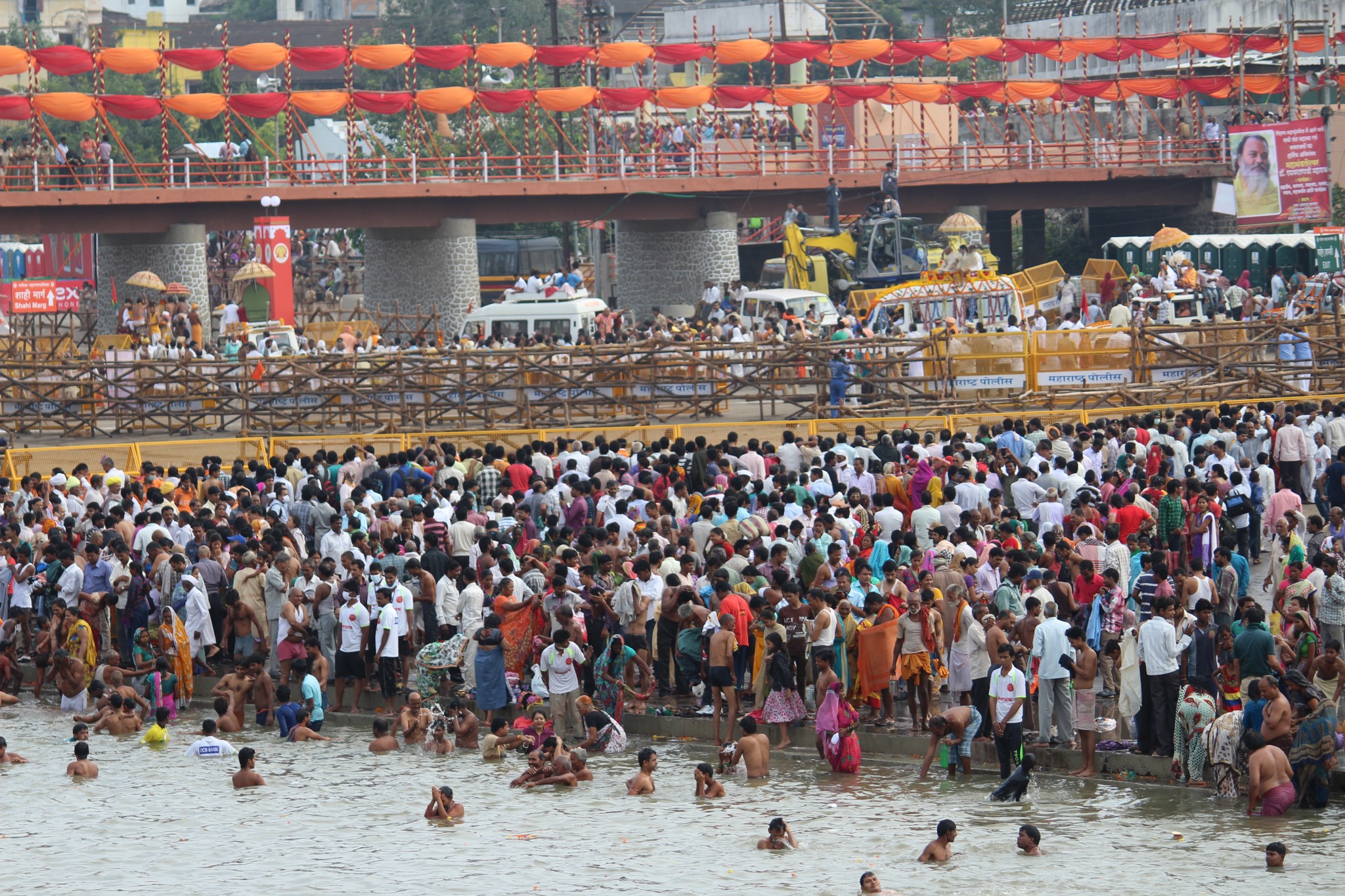 The shahi snan area and procession separated by barricades at Ramkund, Nashik