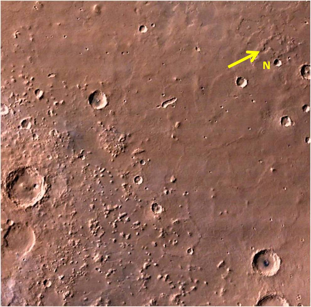 MCC image shows relatively smooth plains dotted with some craters and stepped mesas and knobs.