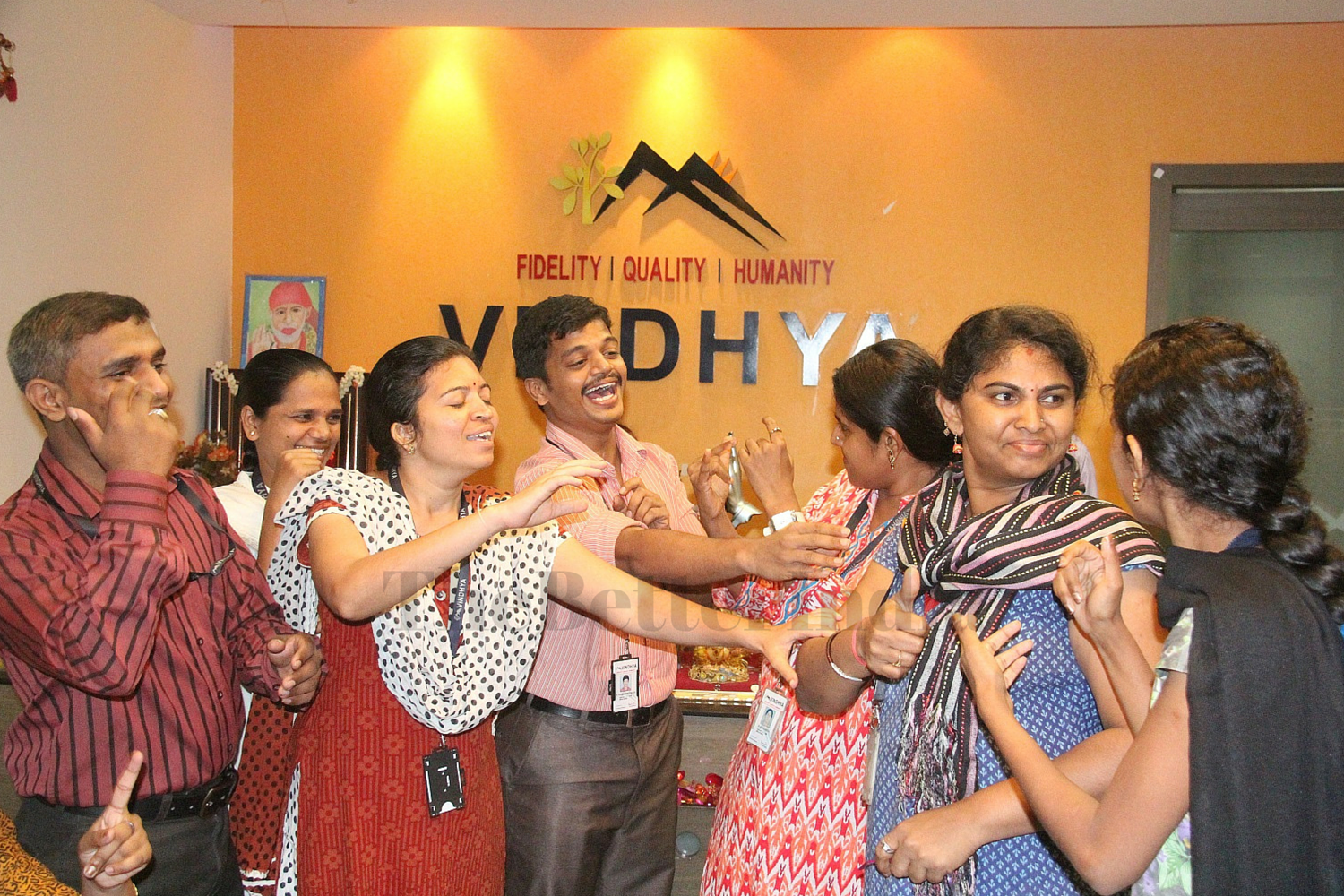 An informal sign language interaction between some of the employees in the Reception area of Vindhya E Infomedia
