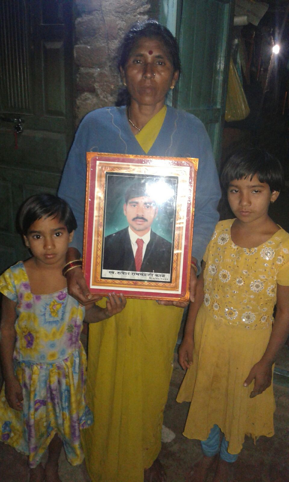 Subhadra Kale (Rupesh's mother) along with Rupesh's two daughters. In frame: Late Rupesh Kale