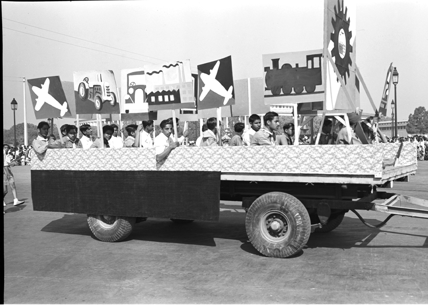 Studio/Jan.52,A52h A view of the Republic Day Cultural Pageant  Republic Day (January 26, 1952): Tableau showing Youth & Progress  The machines depict growing development in transport and industry. The plough symbioses rural economy and the urge to grow more food.