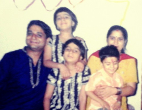 Pooja with her family when she was young.