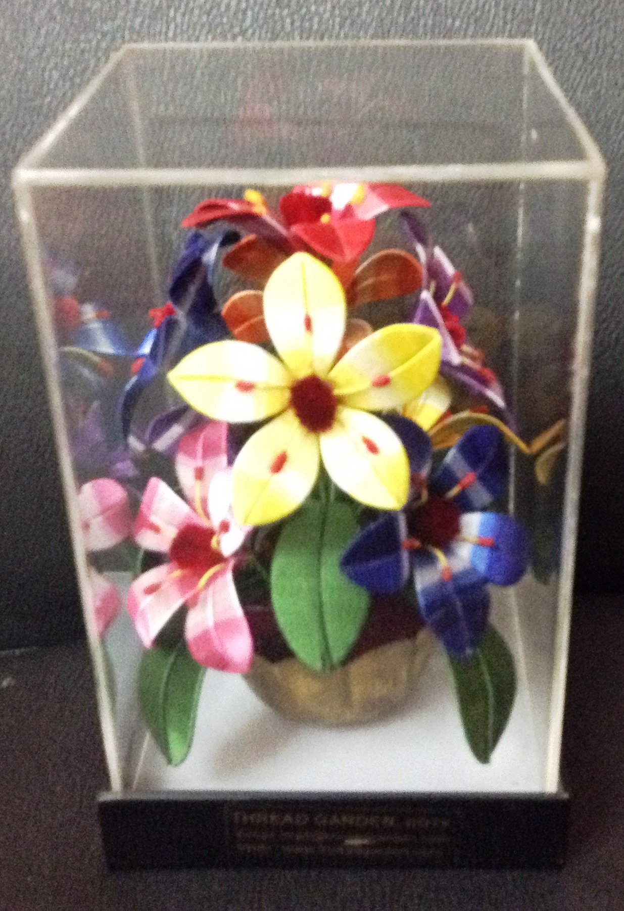  Encased in glass, flowers sold at the sales counter Photo credit: Aparna Menon