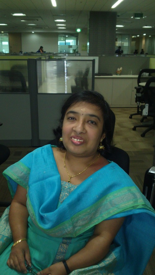 Pradha in mobile chair in office