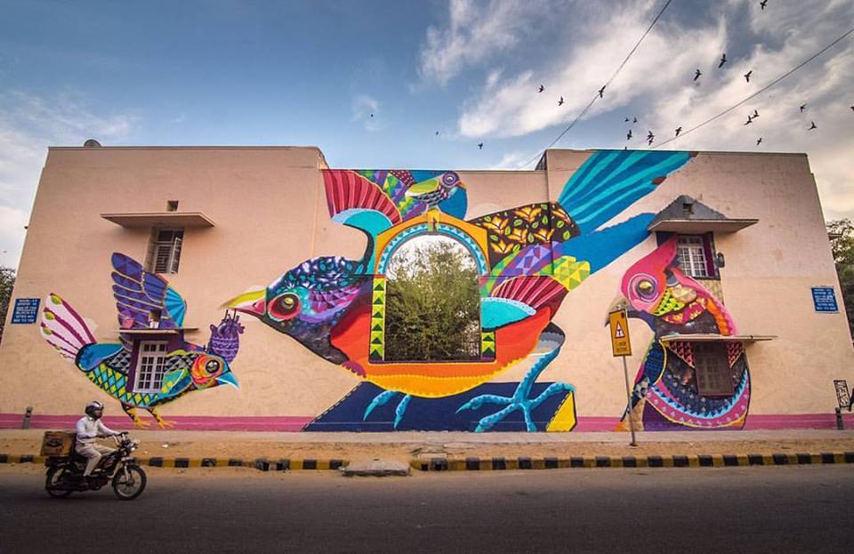 "Colours of the soul by Senkoe. Inspired by the beauty of nature, Senkoe painted these birds in Lodhi colony to represent the colourful diversity of the people who live there and also to encourage them to communicate with each other and share stories, just like the birds would."