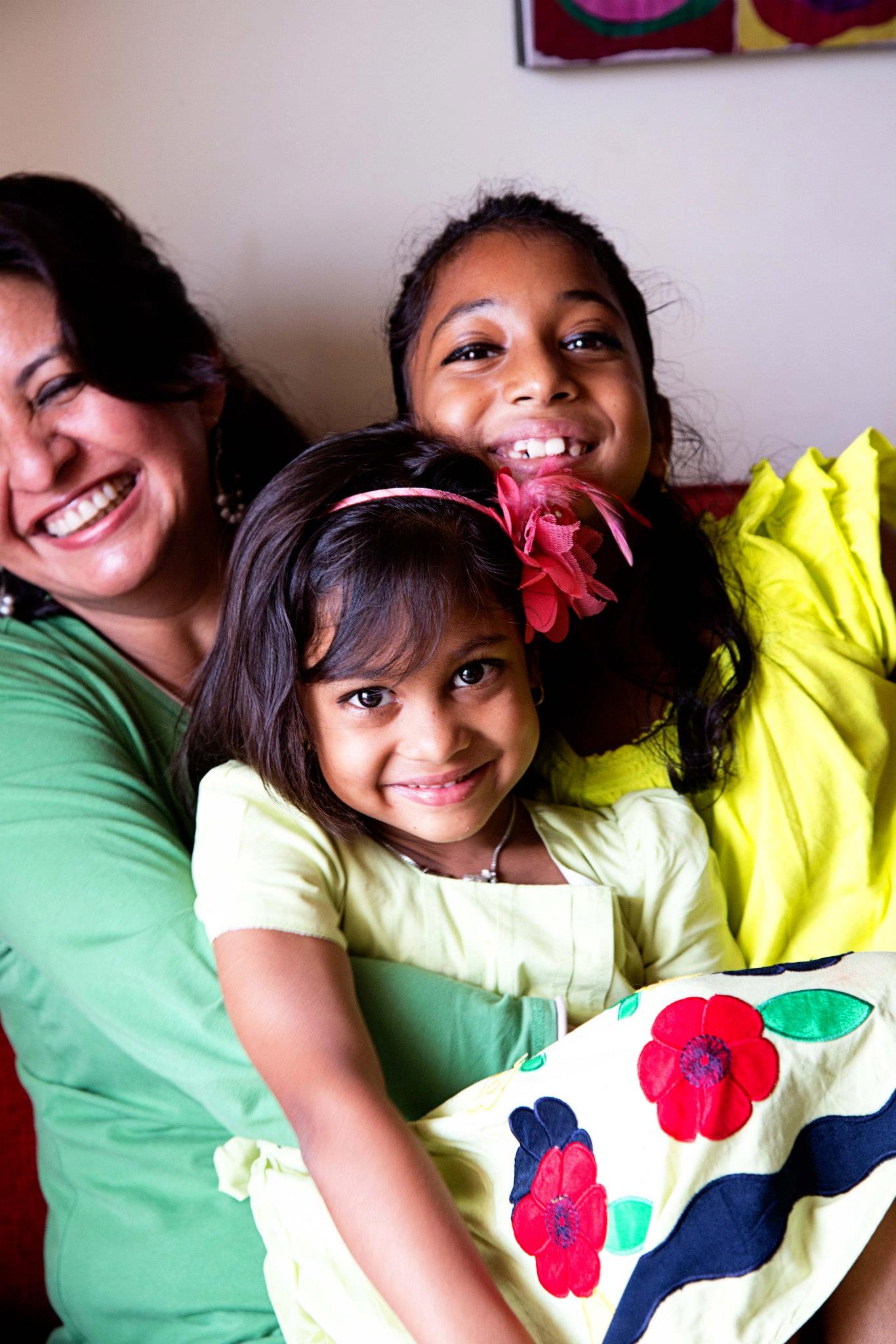 Malini with her adopted daughters 