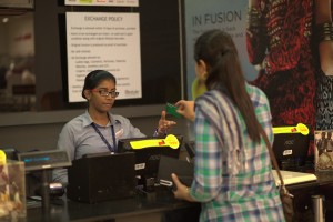 A beneficiary of Pankh who today, works as a cashier with a reputed retail chain