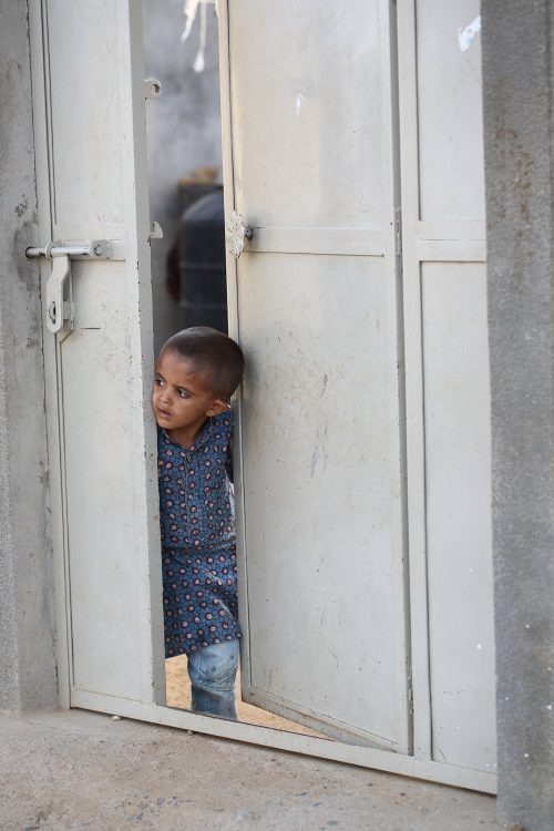 A little boy dons a Ajrakh creation from his hometown - Ajrakhpur