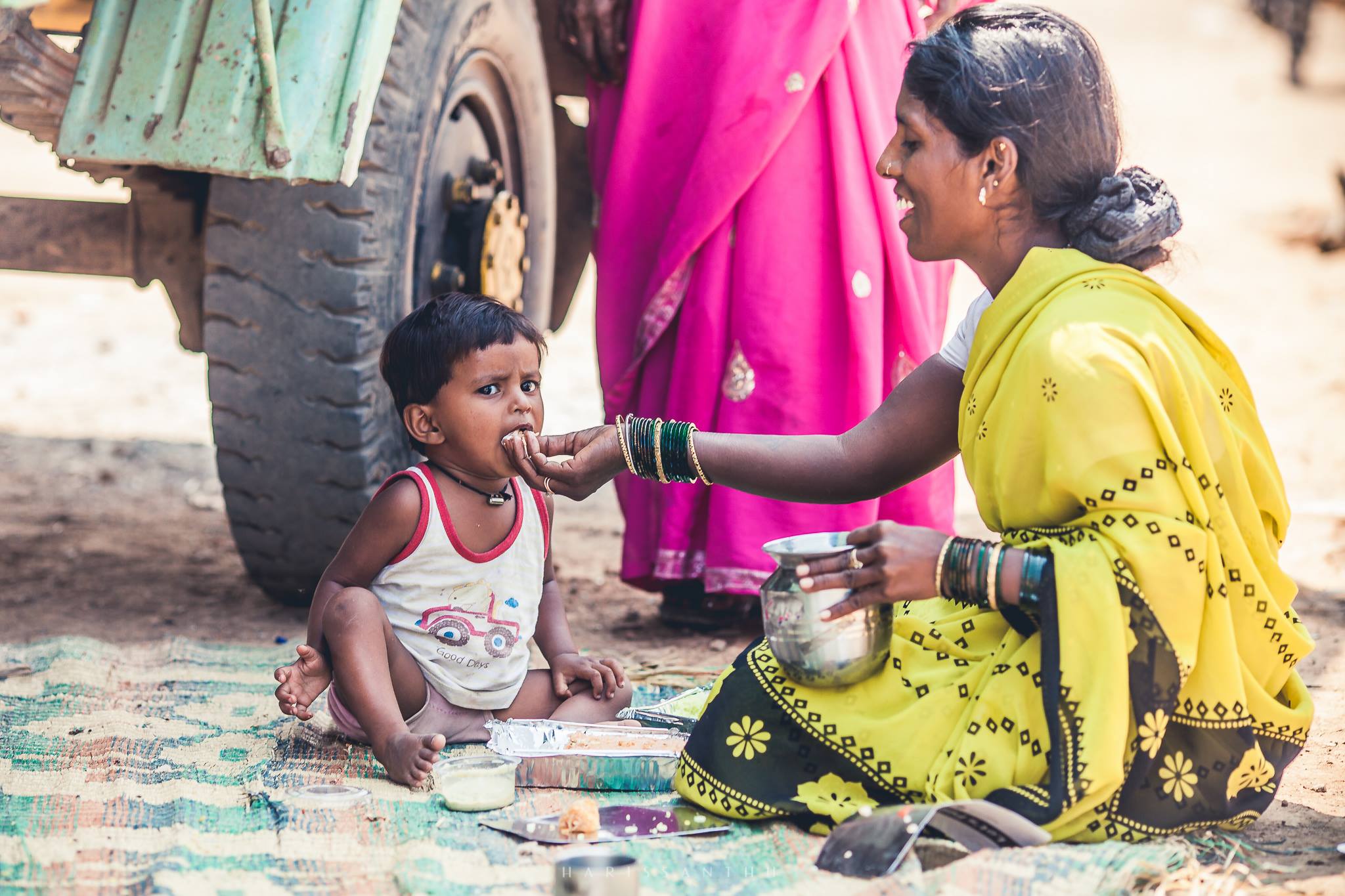 A mother feeding her child