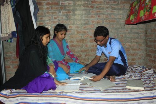 Mohammad with his two sisters.