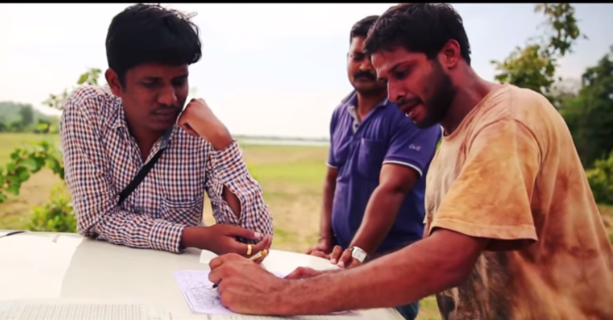 Hans working with forest officials